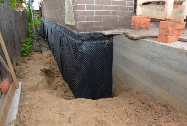 Happy homeowners after waterproofing job in New Providence